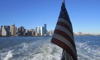 US Flag off back of boat in NY Harbor photo by Jeffrey Milstein US Flag New York Harbor