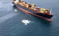 A fly over shot of the M/V Rena grounded on Astrolabe Reef on October 8. Photo: Maritime New Zealand