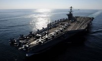 The Nimitz-class aircraft carrier USS John C. Stennis (CVN 74) transits the Straits of Hormuz, Nov. 12, 2011. (U.S. Navy photo by Mass Communication Specialist 3rd Class Kenneth Abbate/Released)