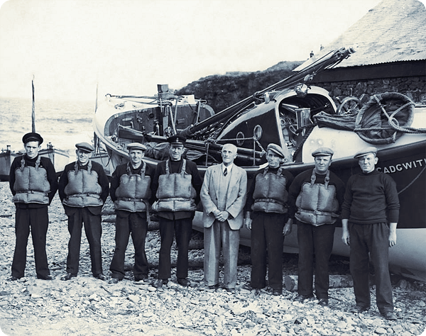 Crew of RNLI lifeboat ‘Guide of Dunkirk’in Cadgwith, Cornwall