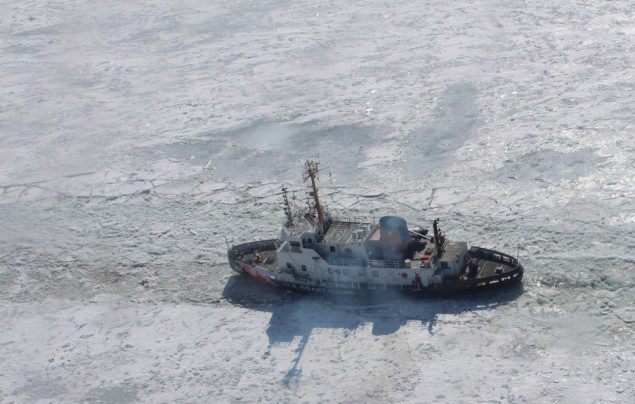 The crew of Coast Guard Cutter Neah Bay, a 140-foot ice-breaking tug homported in Cleveland, breaks through the ice in the St. Clair River, Feb. 26, 2014. U.S. Coast Guard Photo
