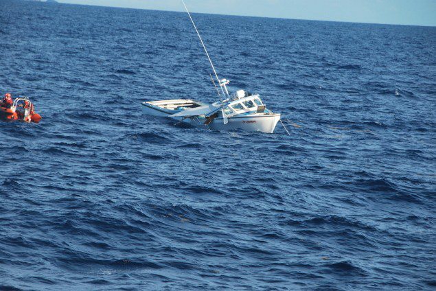 The 42-foot fishing vessel Sea Shepherd sinks approximately nine nautical miles northeast of Vieques, Puerto Rico, following a collision with the Coast Guard Cutter Key Largo, Tuesday, Sept. 23, 2014. U.S. Coast Guard Photo