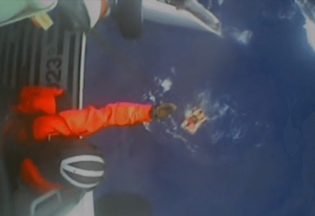 A screenshot of U.S. Coast Guard video showing the rescue of five people Friday, Jan. 30, 2015, from a sailboat after the sailboat's mast broke approximately 200 miles off the coast of North Carolina. 