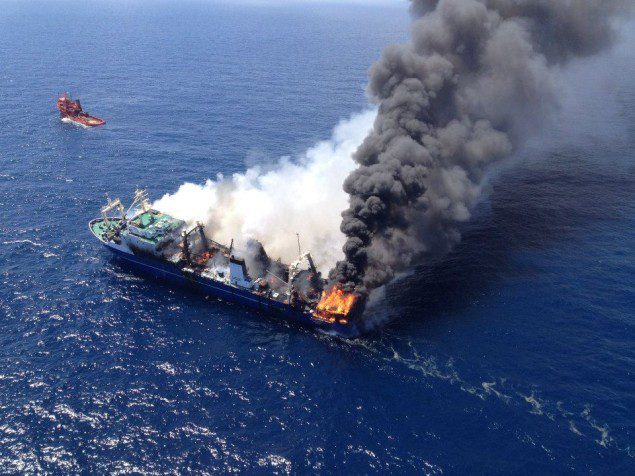 The Oleg Naydenov seen on fire after being towed out to see off the Canary Islands. Photo: Salvamento Maritimo