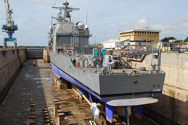 USS Port Royal sits in drydock at the Pearl Harbor Naval Shipyards