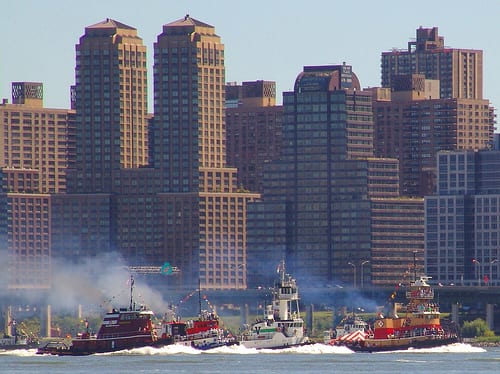 Tugboats Racing up the Hudson River