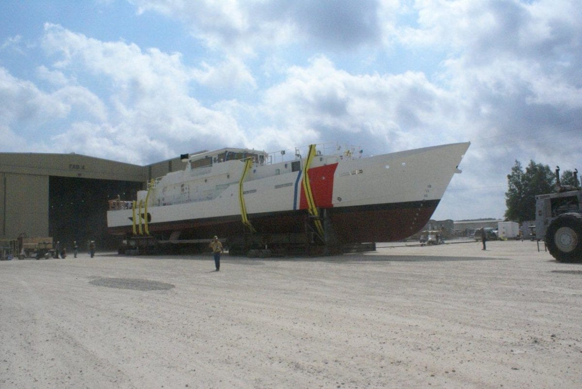 The total evolution to move Coast Guard Cutter Bernard C. Webber took three days.  Here, Webber is shown exiting the fabrication shop on the way to the pier where the launch will occur. U.S. Coast Guard photo.