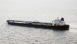 Iranian Supertanker Collides with Containership off Singapore