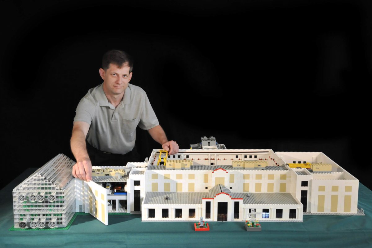 William Adams of Code 5515 creates model of NAVY LASR building from legos.