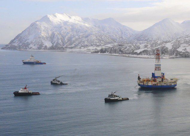 The Aiviq (blue hull) escorts the tugs Corbin Foss, Ocean Wave and Lauren Foss as they tow the conical drilling unit Kulluk from Kiliuda Bay near Kodiak Island, Alaska, Feb. 26, 2013. The Kulluk is being towed to Dutch Harbor where it will be loaded aboard a heavy lift vessel for transport to Asia. (U.S. Coast Guard photo by Petty Officer 1st Class Sara Francis) Read more: http://www.dvidshub.net/image/874860/coast-guard-conducts-overflight-kulluk-tow-kiliuda-bay-alaska#.US2MNqWi3zI#ixzz2M8i4Nbyx