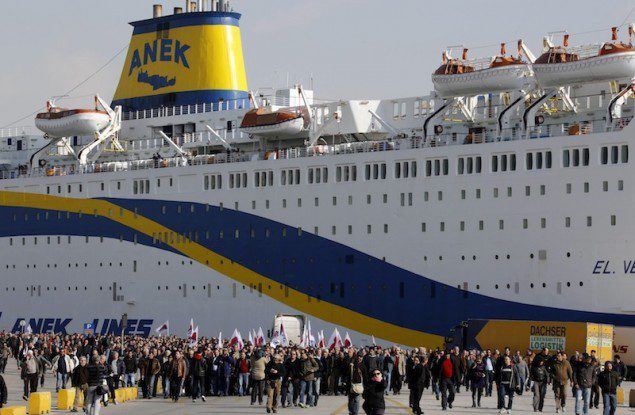 Striking seamen and activists from the communist-affiliated trade union PAME march through the port of Piraeus near Athens February 6, 2013. REUTERS/Yannis Behrakis