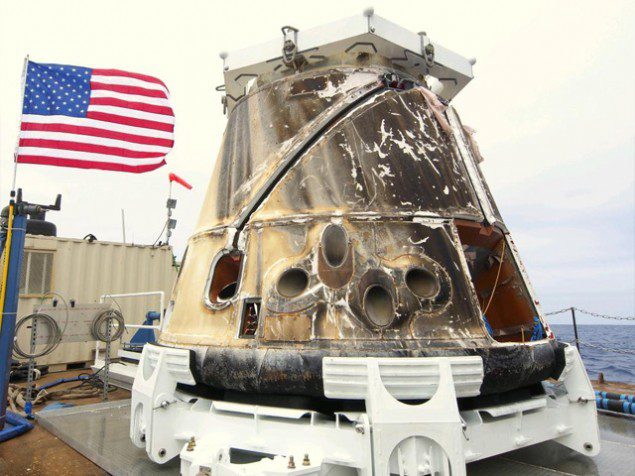 SpaceX's Dragon spacecraft on the barge after being retrieved from the Pacific Ocean after splashdown, May 31, 2012. Photo: SpaceX