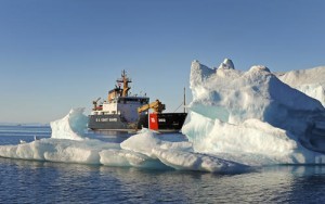 Coast Guard Cutter Willow transits by an iceberg on an Arctic patrol. U.S. Coast Guard photo by Petty Officer 3rd Class Luke Clayton.
