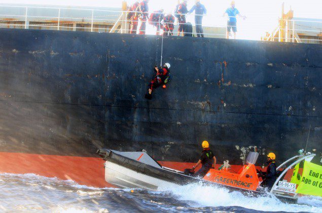 Six Greenpeace activists board a coal ship bound for South Korea near Australia's Great Barrier Reef in this handout picture from environmental group Greenpeace April 24, 2013. Image (c) REUTERS/Greenpeace