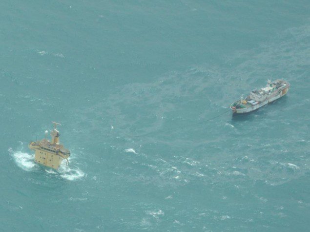 The FV Naham 3 tied to the stern of the sunken MV Albedo. Photo: EUNAVFOR