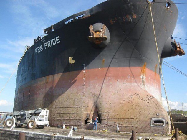 Damage to the FR8 Pride, including the puncture to the hull below the waterline, visible in the lower center of the image. Photo provided by the Coast Guard.