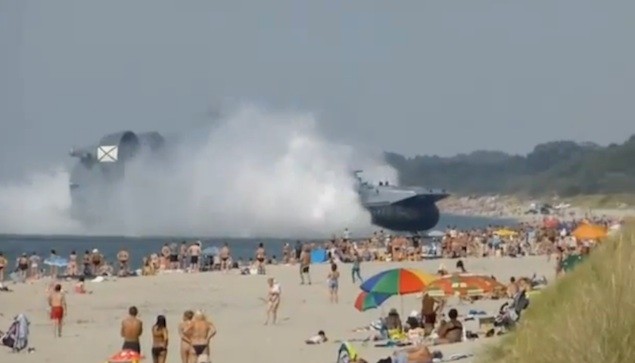 Russian Hovercraft Parks On Crowded Beach [VIDEO]