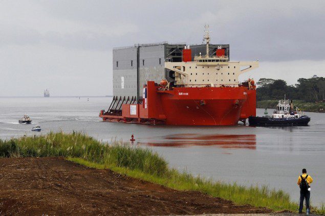 The first four new gates of the expanded Panama Canal arrive in Colon on August 20, 2013 . REUTERS/ Carlos Jasso 