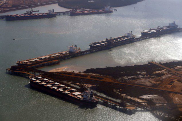 Ships waiting to be loaded with iron ore are seen at Port Hedland in the Pilbara region of Western Australia. Photo: REUTERS/David Gray
