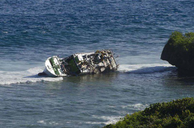 The Japanese commercial fishing vessel Daiki Maru can be seen from Orote Point on U.S. Naval Base Guam. U.S. Navy Photo
