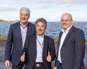The four ocean going tugs will be constructed at Niigata, Japan. Their project manager, Shigeru Morioka (middle), was present at the contract announcement at Ulstein Design & Solutions in Norway on Monday. To the left in the photo is Sigurd Viseth, managing director UDS, to the right, area sales manager Ove Dimmen, UDS. Photo courtesy Ulstein Group