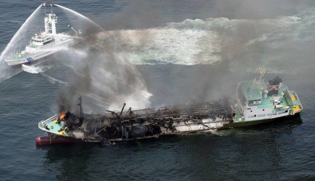 Smoke raises from the fuel tanker Shoko Maru after it exploded off the coast of Himeji, western Japan, in this photo taken by Kyodo May 29, 2014. Mandatory credit REUTERS/Kyodo