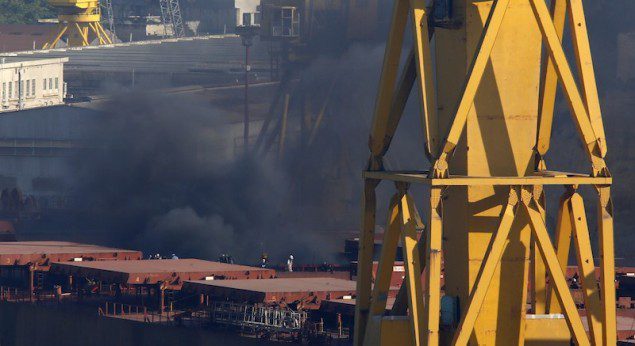 Thick black smoke rises from the deck of the Liberia-registered bulk carrier Cape Tavor at the Palumbo dockyard in Valletta's Grand Harbour