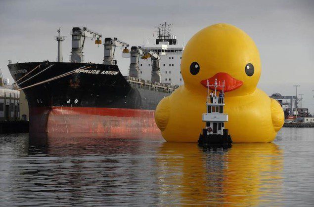 Giant inflatable rubber duck installation by Dutch artist Hofman floats through the Port of Los Angeles as part of the Tall Ships Festival, in San Pedro
