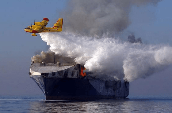 Watch: Water-Bombing Plane Fights Ship Fire from Air