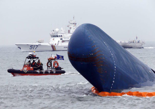 Rescue boats sail around the South Korean passenger ship "Sewol" which sank, during their rescue operation in the sea off Jindo, in this April 17, 2014. REUTERS/Kim Kyung-Hoon