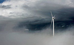 wind turbine storm clouds power renewable energy