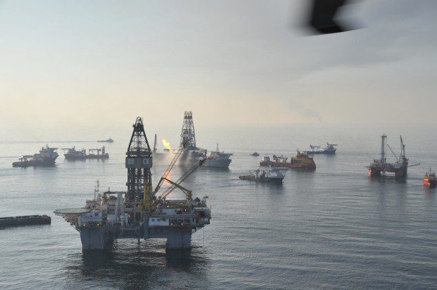 Skimming vessels, support vessels and oil rigs at the site of the Deepwater Horizon disaster in the Gulf of Mexico, June 13, 2010. U.S. Coast Guard Photo