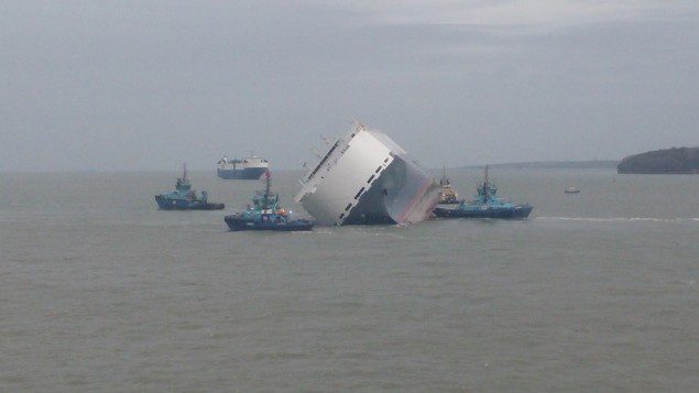 The Hoegh Osaka car carrier being assisted by tugs away the Bramble Bank after the ship self-floated, January 6, 2015. Photo courtesy Casey Sheargold