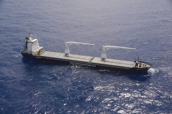 Disabled Cargo Ship Near Great Barrier Reef Under Tow
