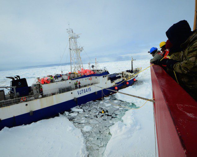 Members of the military dive team aboard Coast Guard Cutter Polar Star launch a remote operated vehicle into the water to inspect the disabled fishing vessel Antarctic Chieftain, beset by ice near Cape Burks, Antarctica, Feb. 14, 2015. U.S. Coast Guard Photo