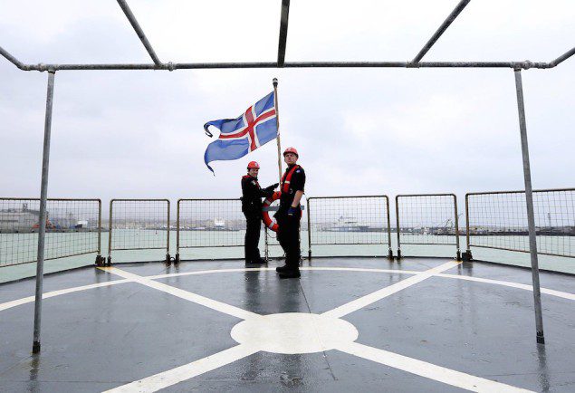 Icelandic coast guards hoist their national flag on the vessel Tyr as they sail from Catania harbour to off the eastern coast of Sicily March 17, 2015. REUTERS/Alessandro Bianchi