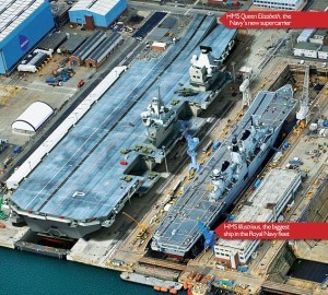HMS Queen Elizabeth next to the current largest ship in the fleet HMS illustrious.