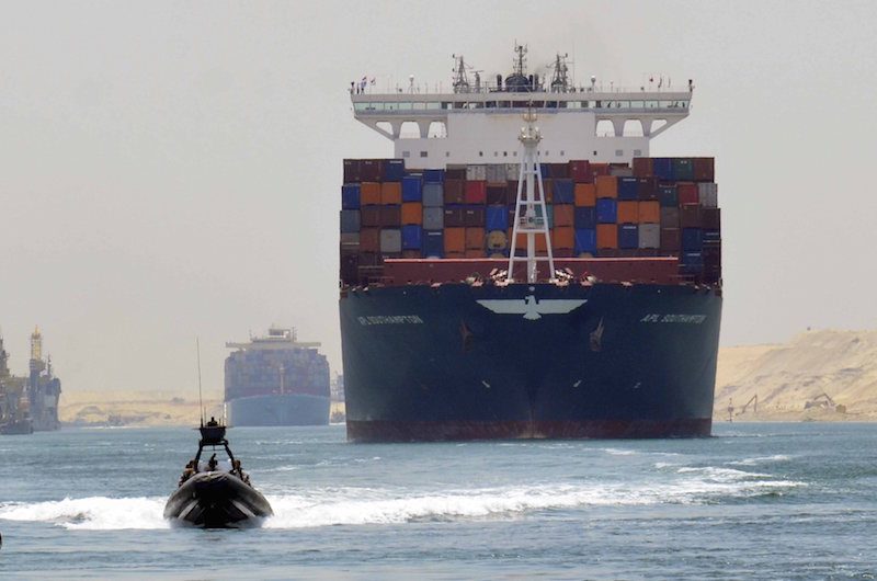 First Cargo Ships Take Trial-Run Through New Suez Canal