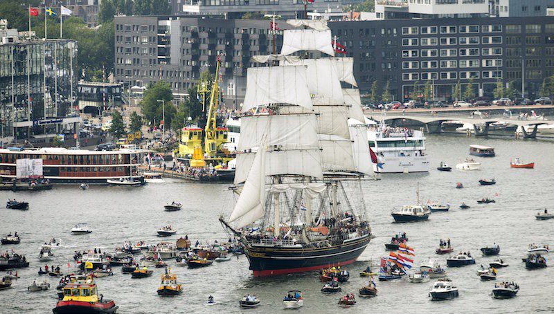 The Stad Amsterdam (C) clipper sails during the Sail-In Parade marking the beginning of the Sail Amsterdam 2015 nautical festival held every five years in Amsterdam, Netherlands August 19, 2015. REUTERS/Toussaint Kluiters/United Photos