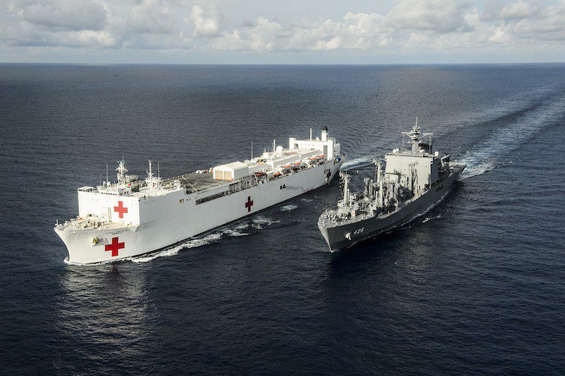 WESTERN PACIFIC (Aug. 13, 2015) The Japanese fleet oiler JS Mashu (AOE 425) takes part in a replenishment at sea with the hospital ship USNS Mercy (T-AH 19) during Pacific Partnership 2015. Pacific Partnership is in its tenth iteration and is the largest annual multilateral humanitarian assistance and disaster relief preparedness mission conducted in the Indo-Asia-Pacific region. While training for crisis conditions, Pacific Partnership missions to date have provided real world medical care to approximately 270,000 patients and veterinary services to more than 38,000 animals. Additionally, the mission has provided critical infrastructure development to host nations through more than 180 engineering projects. (U.S. Navy photo by Mass Communication Specialist 2nd Class Mark El-Rayes/Released)