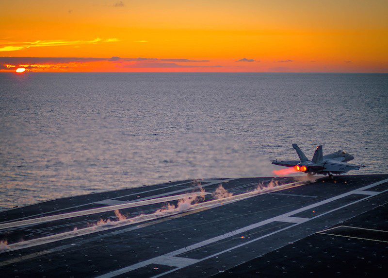 150710-N-DV340-024 PACIFIC OCEAN (July 10, 2015) An F/A-18E Super Hornet assigned to the Kestrels of Strike Fighter Squadron (VFA) 137 launches at sunset from the flight deck of the aircraft carrier USS Ronald Reagan (CVN 76). Ronald Reagan is underway off the coast of Southern California. (U.S. Navy photo by Mass Communication Specialist 2nd Class Chase C. Lacombe/Released)