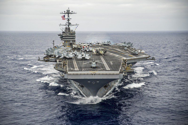 150807-N-IP531-342 PACIFIC OCEAN (Aug. 7, 2015) The Nimitz-class aircraft carrier USS George Washington (CVN 73) transits the Pacific Ocean. George Washington and its embarked air wing, Carrier Air Wing (CVW) 5, are en route to conduct a hull-swap with the Nimitz-class aircraft carrier USS Ronald Reagan (CVN 76) after serving seven years as the U.S. Navy's only forward-deployed aircraft carrier in Yokosuka, Japan. (U.S. Navy photo by Mass Communication Specialist 3rd Class Chris Cavagnaro/Released)