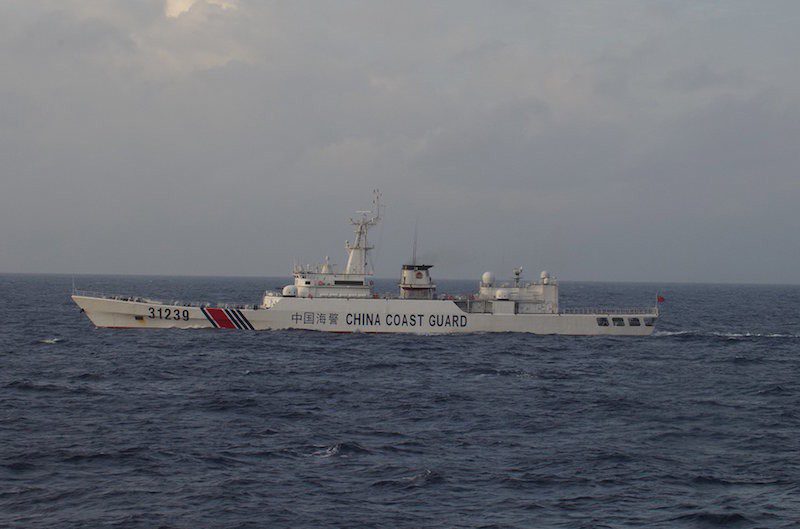 China Coast Guard vessel No. 31239 sails in the East China Sea near the disputed isles known as Senkaku isles in Japan and Diaoyu islands in China, in this handout photo taken and released by the 11th Regional Coast Guard Headquarters-Japan Coast Guard December 22, 2015. REUTERS/11th Regional Coast Guard Headquarters-Japan Coast Guard