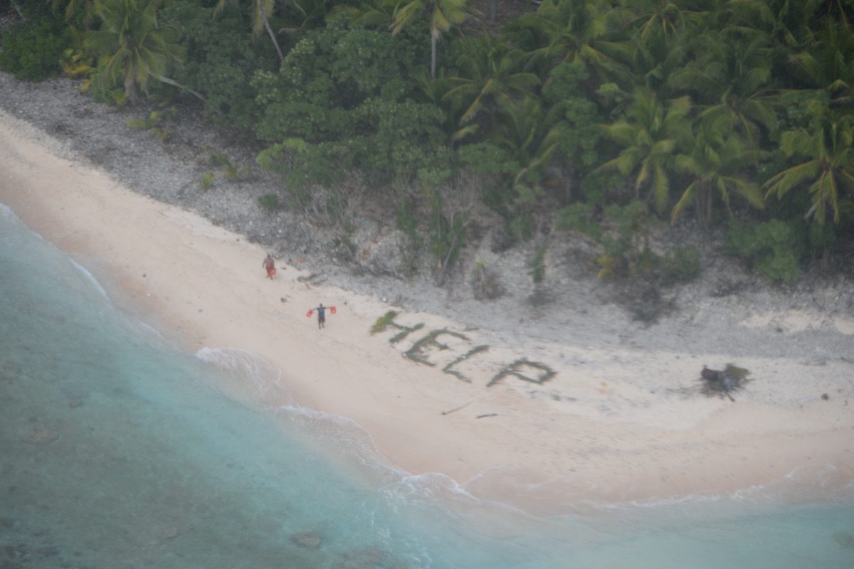 Three Castaways Rescued from Deserted Island After Writing “HELP” on Sand