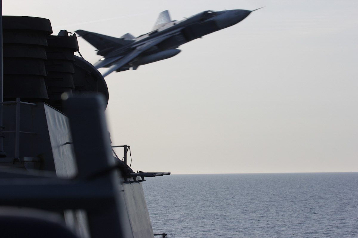 Watch How Incredibly Close Two Russian Fighter Jets Came to a U.S. Navy Destroyer