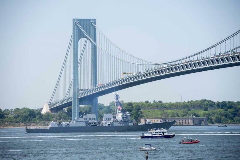 160525-N-KG407-296 NEW YORK (May 5, 2016) — Arleigh Burke-class guided missile destroyer USS Bainbridge (DDG 96) passes under the Verrazano Bridge during a parade of ships in the New York Harbor river to mark the start of 2016 Fleet Week New York. The event Fleet Week New York, now in its 28th year, is the city's time-honored celebration of the sea services. It is an unparalleled opportunity for the citizens of New York and the surrounding tri-state area to meet Sailors, Marines and Coast Guardsmen, as well as witness firsthand the latest capabilities of today's maritime services. The weeklong celebration has been held nearly every year since 1984. (U.S. Navy photo by Mass Communication Specialist 3rd Class Kameren Guy Hodnett/ Released.)