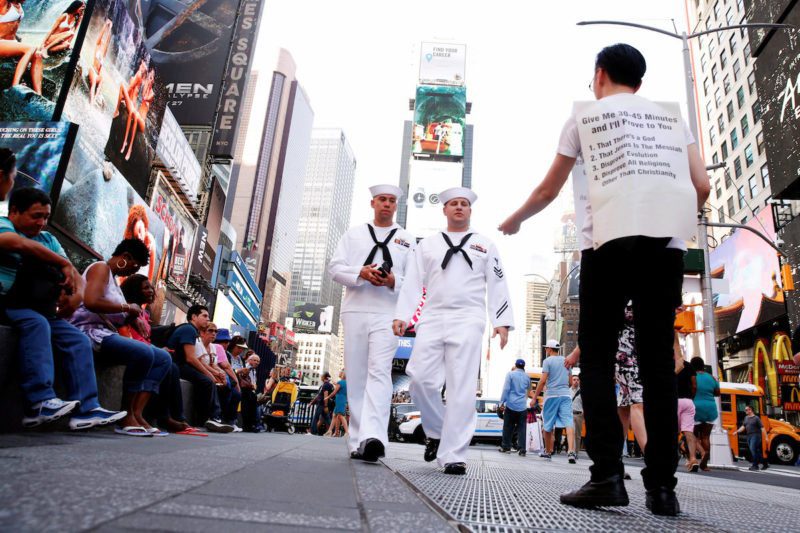 U.S. Navy sailors walk through Times Square during Fleet Week in New York, U.S., May 25, 2016. REUTERS/Lucas Jackson