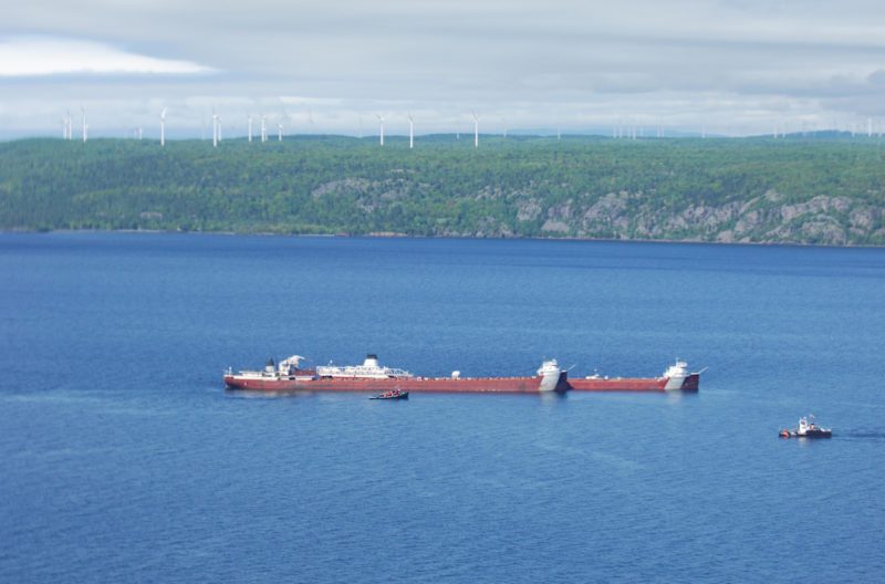The motor vessel Phillip R. Clarke arrives on scene with the motor vessel Roger Blough, which ran aground May 27, near Gros Cap Reefs Light in Lake Superior, June 2, 2016. The Clarke is scheduled to remove some of the taconite from the Blough in order to lighten the Blough so it can be refloated. (Photo courtesy of Transport Canada)