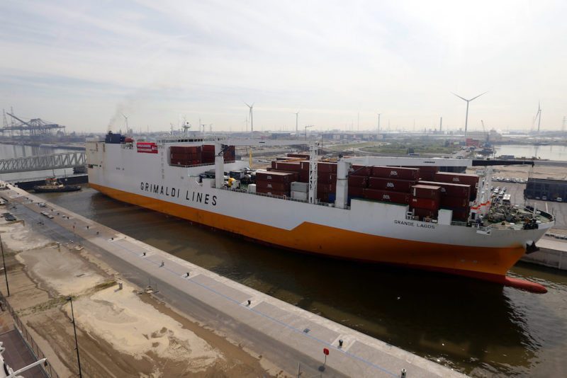 A cargo ship crosses the world's biggest lock "Kieldrechtsluis" during its inauguaration at Belgium's port of Antwerp, June 10, 2016. Picture taken through a window. REUTERS/Francois Lenoir