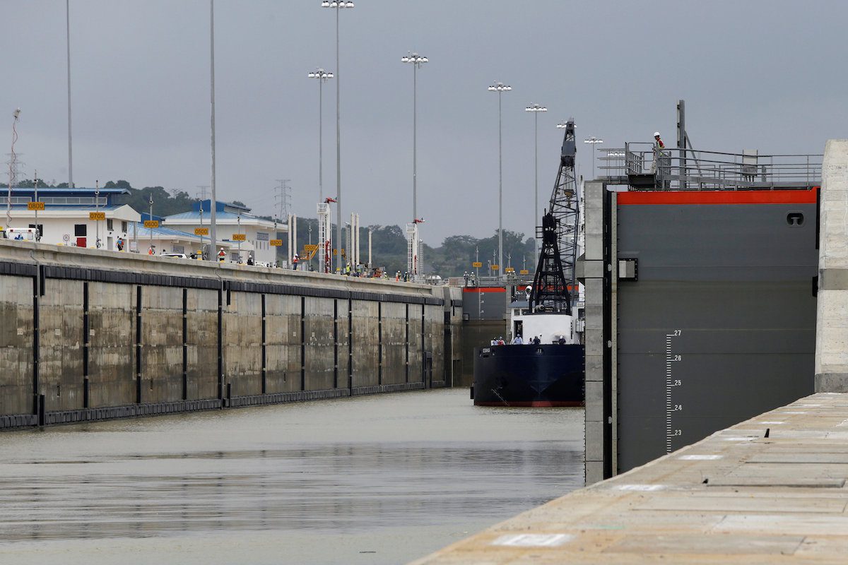 A floating gate opens as a Panama flagged crane ship named Oceanus navigates through Cocoli locks during a test of the new set of locks of the Panama Canal expansion project on the Pacific side in Cocoli, on the outskirts of Panama City, Panama, June 20, 2016. REUTERS/Carlos Jasso